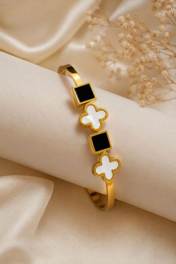 WhatsApp Image 2026-09-01 at 8.35.20 PM Black & White Clover Bracelet