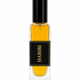 Minimalist perfume bottle with golden liquid